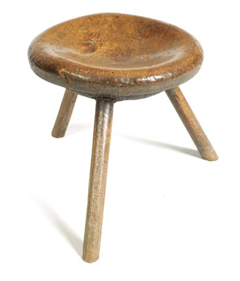 Lot 955 - A LATE 18TH CENTURY PRIMITIVE WALNUT MILKING STOOL