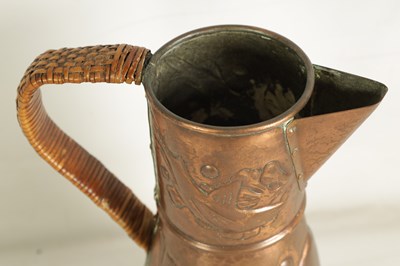 Lot 826 - AN ARTS AND CRAFTS NEWLYN SCHOOL COPPER JUG