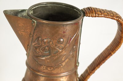 Lot 826 - AN ARTS AND CRAFTS NEWLYN SCHOOL COPPER JUG