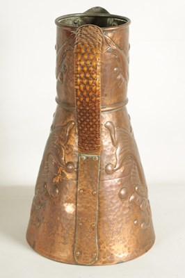 Lot 826 - AN ARTS AND CRAFTS NEWLYN SCHOOL COPPER JUG