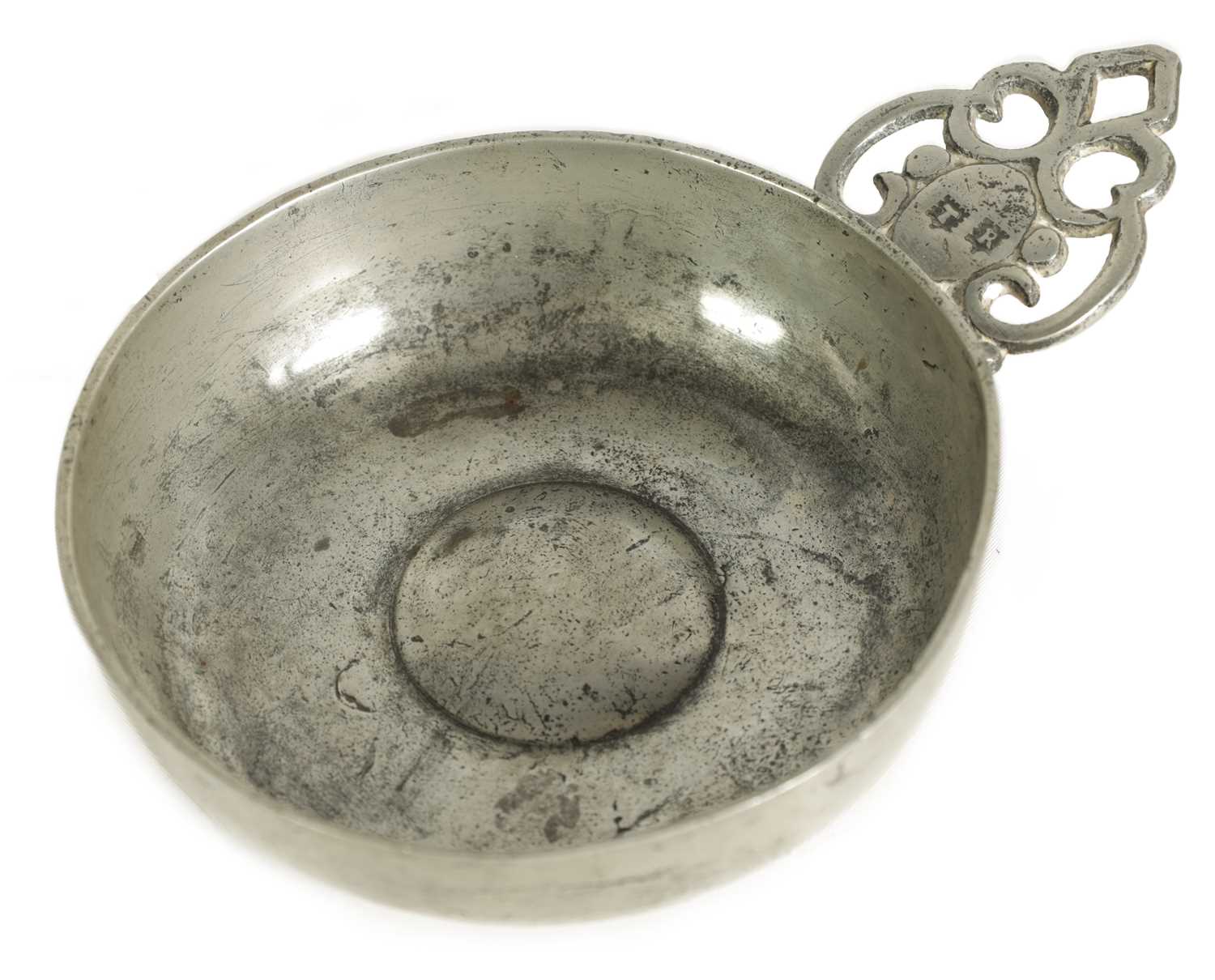 Lot 541 A RARE ENGLISH PEWTER PORRINGER CIRCA 1663