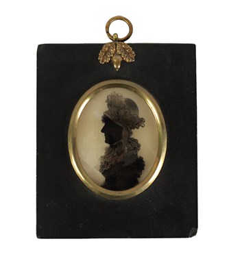 Lot 732 - HINTON GIBBS AN EARLY 19TH CENTURY OVAL SILHOUETTE BUST PORTRAIT OF A LADY REVERSE PAINTED ON GLASS