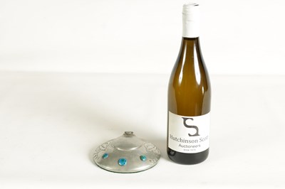 Lot 555 - AN ARTS AND CRAFTS TUDRIC PEWTER CIRCULAR INK WELL AND LINER AFTER DESIGNS BY ARCHI BALD KNOX