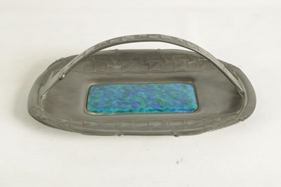 Lot 550 - A STYLISH ARTS AND CRAFTS LIBERTY & Co SHAPED RECTANGULAR PEWTER DISH WITH RAISED HANDLE