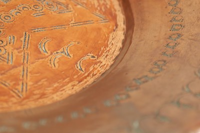 Lot 560 - AN ARTS AND CRAFTS HAMMERED COPPER HANGING CHARGER