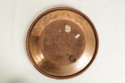Lot 560 - AN ARTS AND CRAFTS HAMMERED COPPER HANGING CHARGER