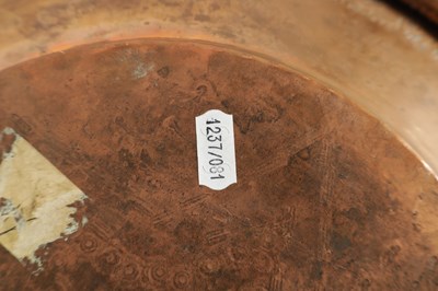 Lot 560 - AN ARTS AND CRAFTS HAMMERED COPPER HANGING CHARGER