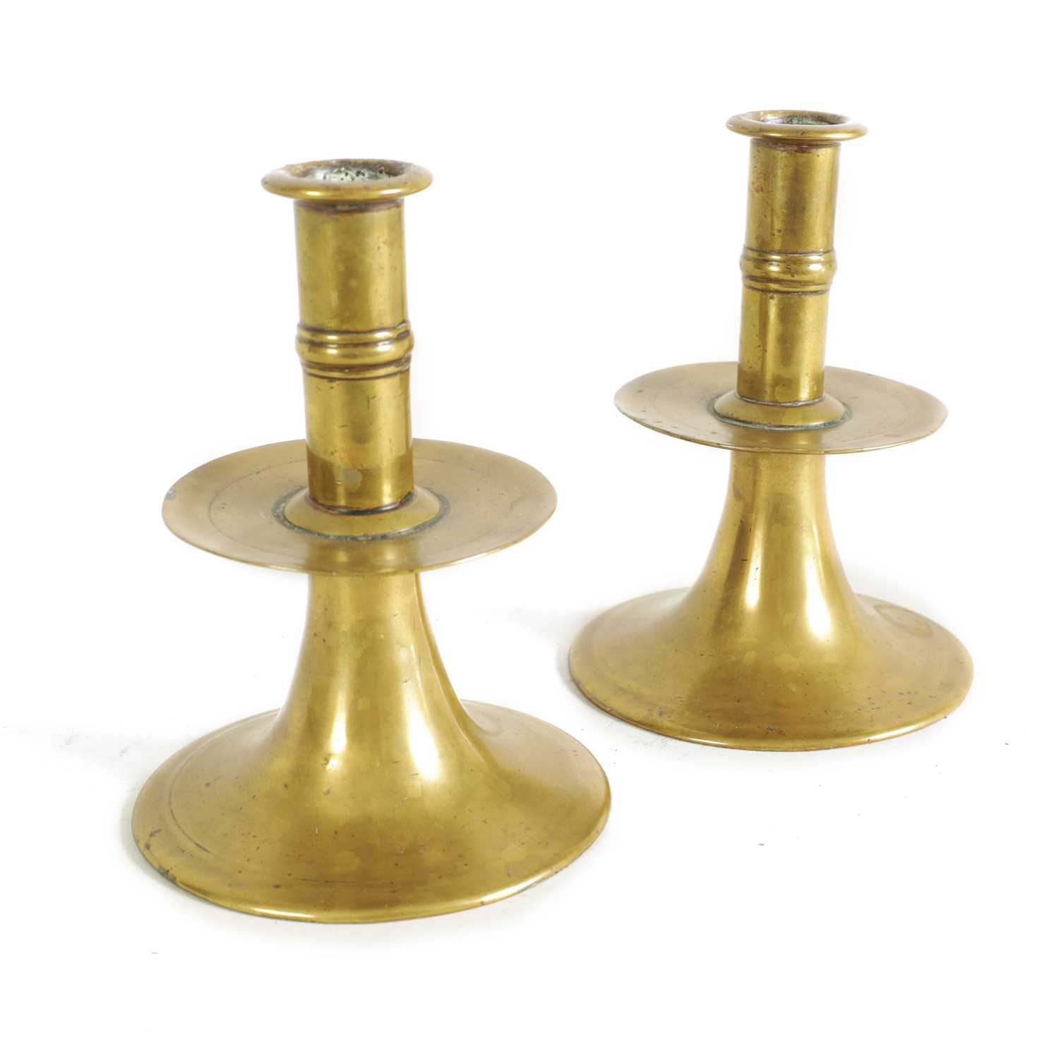 Lot 542 - A RARE PAIR OF 17TH/18TH CENTURY ENGLISH BRASS TRUMPET CANDLE STICKS