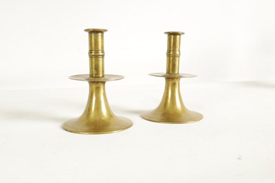 Lot 542 - A RARE PAIR OF 17TH/18TH CENTURY ENGLISH BRASS TRUMPET CANDLE STICKS