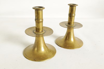 Lot 542 - A RARE PAIR OF 17TH/18TH CENTURY ENGLISH BRASS TRUMPET CANDLE STICKS