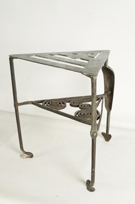 Lot 543 - AN 18TH/19TH-CENTURY IRONWORK TRIANGULAR FOOTMAN