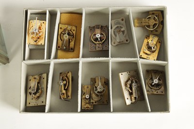 Lot 207 - A BOXED COLLECTION OF CARRIAGE CLOCK LEVER AND BALANCE WHEEL PLATFORM ESCAPEMENTS