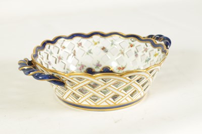 Lot 53 - A 19TH CENTURY FIRST PERIOD WORCESTER TYPE TWO-HANDLED LATTICEWORK BASKET