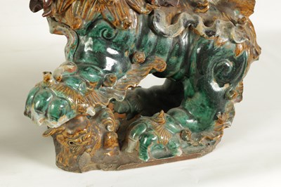 Lot 137 - A LARGE PAIR OF 19TH CENTURY GLAZED TERRACOTTA DOGS OF FO