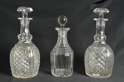 Lot 16 - A PAIR OF LATE GEORGIAN CUT GLASS DECANTERS