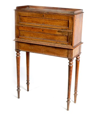 Lot 1034 - A LATE 19TH CENTURY OAK DROP FRONT STATIONARY CABINET