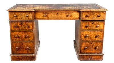 Lot 1027 - A MID 19TH CENTURY FIGURED WALNUT BREAKFRONT PEDESTAL DESK