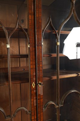 Lot 1050 - AN UNUSUAL LATE GEORGE III GONCALO ALVES AND KINGWOOD BOOKCASE