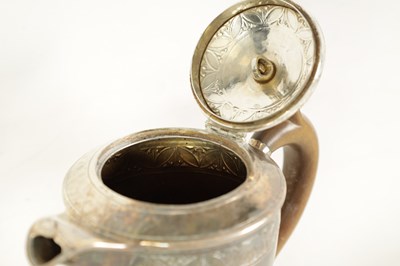 Lot 290 - A GEORGE V SILVER HOT WATER JUG