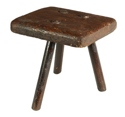 Lot 1003 - A 19TH CENTURY RUSTIC ELM MILKING STOOL