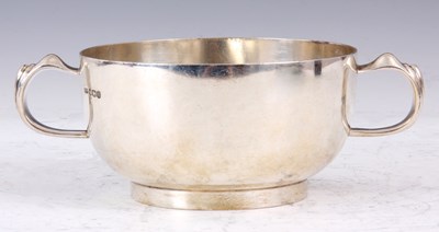 Lot 332 - A GEORGE VI PLAIN TWO HANDLED SILVER PORRINGER...