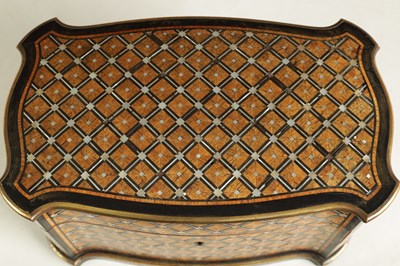 Lot 867 - TAHAN, PARIS. A FINE 19TH CENTURY KINGWOOD AND MOTHER OF PEARL PARQUETRY EBONY BANDED AND BRASS BOUND SERPENTINE TEA CADDY