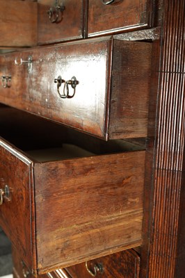 Lot 1260 - A FINE EARLY 18TH CENTURY FIGURED WALNUT CHEST ON CHEST