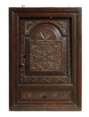 Lot 930 - AN EARLY 18TH CENTURY OAK HANGING WALL CUPBOARD