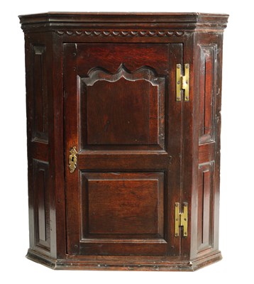 Lot 993 - A MID 18TH CENTURY JOINED OAK HANGING CORNER CUPBOARD