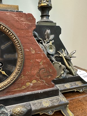 Lot 596 - A LATE 19TH CENTURY FRENCH BLACK SLATE AND ROUGE MARBLE BRONZE FIGURAL MANTEL CLOCK