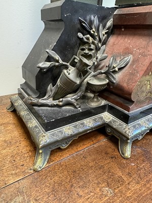 Lot 596 - A LATE 19TH CENTURY FRENCH BLACK SLATE AND ROUGE MARBLE BRONZE FIGURAL MANTEL CLOCK