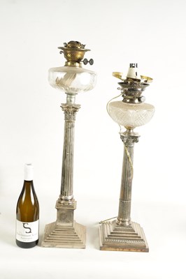 Lot 602 - TWO 19TH CENTURY SILVER PLATED CORINTHIAN COLUMN OIL LAMP BASES