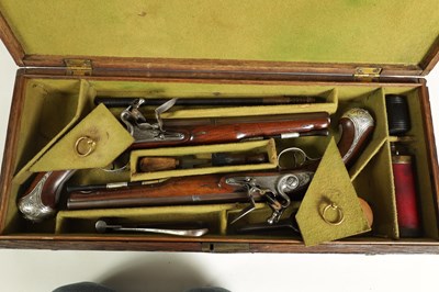 Lot 507 - A CASED PAIR OF 18TH CENTURY SILVER MOUNTED IRISH FLINTLOCK PISTOLS BY EDWARDS, DUBLIN