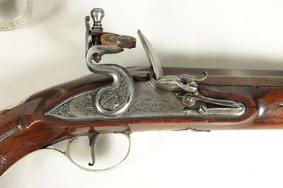 Lot 507 - A CASED PAIR OF 18TH CENTURY SILVER MOUNTED IRISH FLINTLOCK PISTOLS BY EDWARDS, DUBLIN