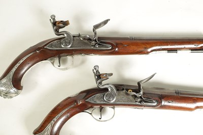 Lot 507 - A CASED PAIR OF 18TH CENTURY SILVER MOUNTED IRISH FLINTLOCK PISTOLS BY EDWARDS, DUBLIN