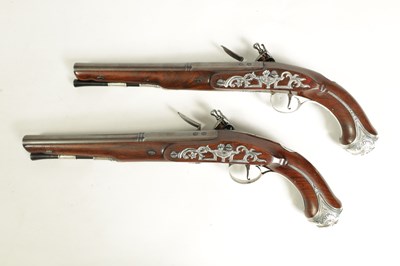 Lot 507 - A CASED PAIR OF 18TH CENTURY SILVER MOUNTED IRISH FLINTLOCK PISTOLS BY EDWARDS, DUBLIN