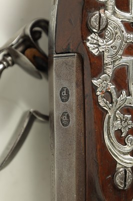 Lot 507 - A CASED PAIR OF 18TH CENTURY SILVER MOUNTED IRISH FLINTLOCK PISTOLS BY EDWARDS, DUBLIN