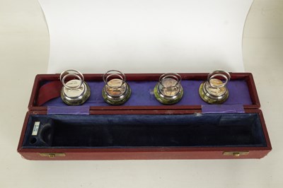 Lot 457 - A SET OF FOUR SILVER AND CONNEMARA MARBLE MENU HOLDERS