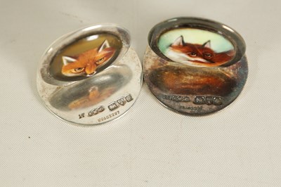 Lot 436 - A PAIR OF SILVER AND ENAMEL FOX MASK MENU HOLDERS