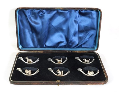 Lot 403 - A CASED SET OF SIX SILVER ANIMAL MENU HOLDERS/NAPKIN RINGS