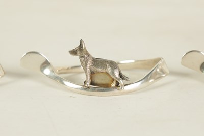 Lot 403 - A CASED SET OF SIX SILVER ANIMAL MENU HOLDERS/NAPKIN RINGS