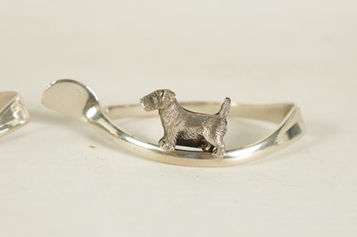 Lot 403 - A CASED SET OF SIX SILVER ANIMAL MENU HOLDERS/NAPKIN RINGS