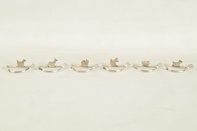 Lot 403 - A CASED SET OF SIX SILVER ANIMAL MENU HOLDERS/NAPKIN RINGS