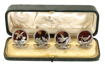 Lot 468 - A CASED SET OF FOUR SILVER AND TORTOISESHELL GAME BIRD MENU HOLDERS