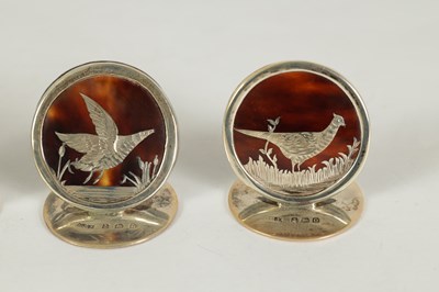 Lot 468 - A CASED SET OF FOUR SILVER AND TORTOISESHELL GAME BIRD MENU HOLDERS