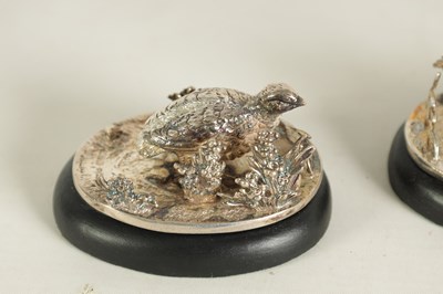 Lot 456 - A SET OF FOUR SILVER GAMEBIRD MENU HOLDERS