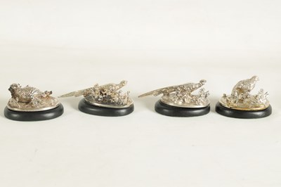 Lot 456 - A SET OF FOUR SILVER GAMEBIRD MENU HOLDERS