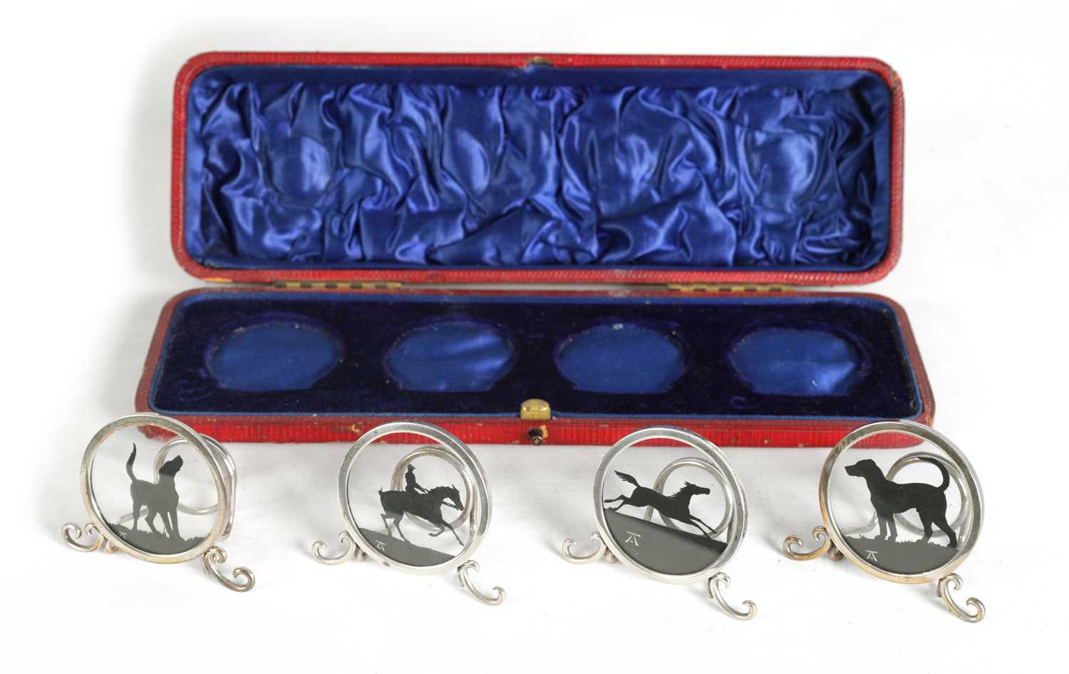 Lot 367 - A RARE CASED SET OF FOUR SILHOUETTE MENU HOLDERS