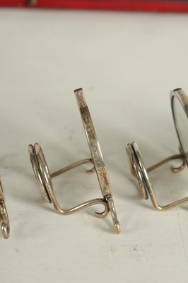 Lot 367 - A RARE CASED SET OF FOUR SILHOUETTE MENU HOLDERS