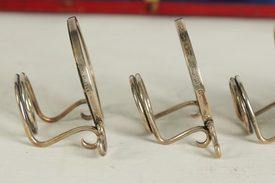 Lot 367 - A RARE CASED SET OF FOUR SILHOUETTE MENU HOLDERS